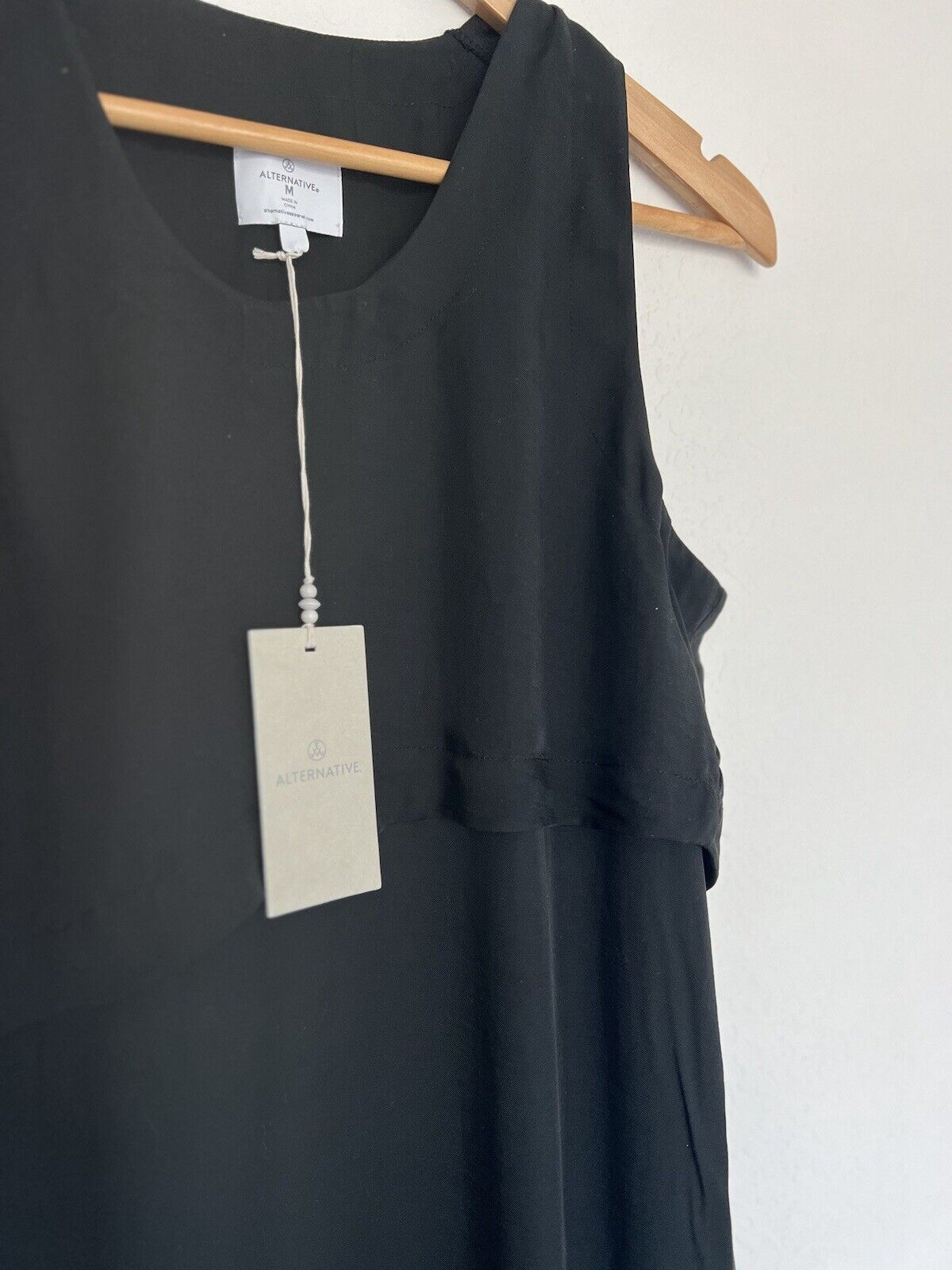 ALTERNATIVE NWT Classic Black Shift Dress Sz M Asymmetric Double Hem Sleeveless