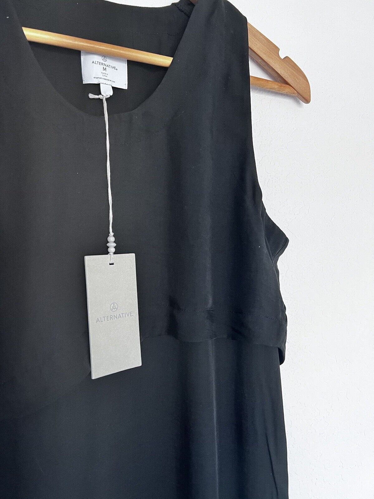 ALTERNATIVE NWT Classic Black Shift Dress Sz M Asymmetric Double Hem Sleeveless